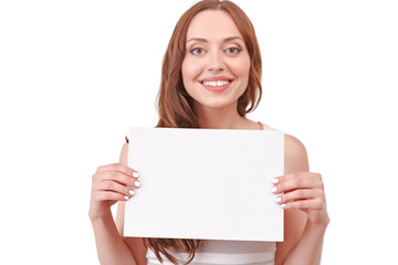 Fototapeta premium Pretty red-haired woman holding paper board 
