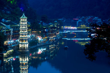 Twilight scene of Pagoda in Fenghuang ancient city.