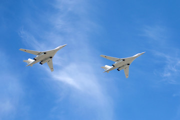 White Swans. Russian military aircraft supersonic bombers with variable sweep wing Tu-160 in flight