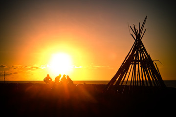 group of people at the beach of bali. © purplegecko