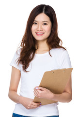 Asian Young woman hold with clipboard