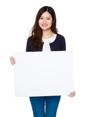 Asian woman show with white poster