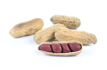 Dried peanuts on white background
