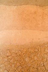 Layer of dry soil cracks to the root.