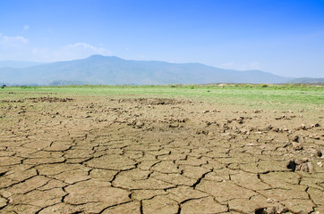 Drought land against a blue sky