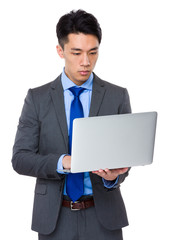 Businessman use of the laptop computer