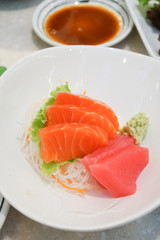 Delicious mixed sashimi on a plate.
