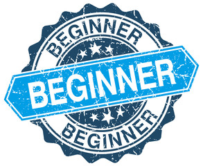 Obraz premium beginner blue round grunge stamp on white