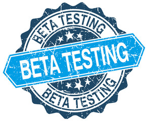 beta testing blue round grunge stamp on white