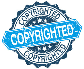 copyrighted blue round grunge stamp on white