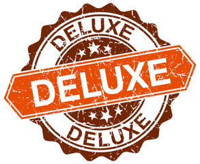 deluxe orange round grunge stamp on white