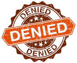 Obraz premium denied orange round grunge stamp on white