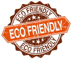 eco friendly orange round grunge stamp on white