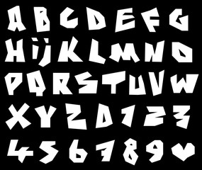 paper cut font and number alphabet in white over black © johnjohnson