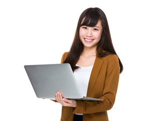 Young businesswoman use of the notebook computer