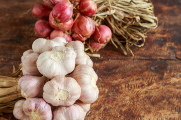 Garlic and onion organic on wooden background