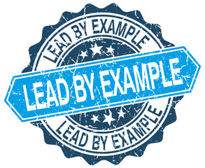 lead by example blue round grunge stamp on white