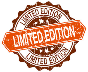 limited edition orange round grunge stamp on white