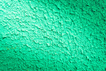 close up crude green concrete grunge texture background with lig