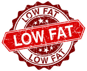 low fat red round grunge stamp on white