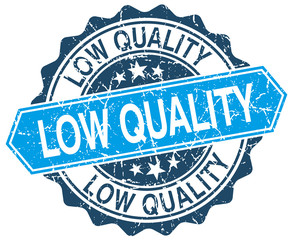 low quality blue round grunge stamp on white