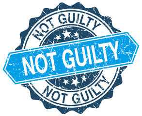 not guilty blue round grunge stamp on white
