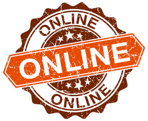 Obraz premium online orange round grunge stamp on white