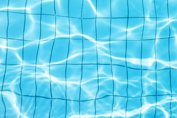 blue wavy water background in swimming pool