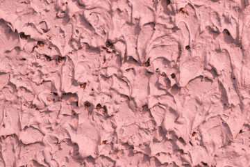close up crude pink concrete grunge texture background