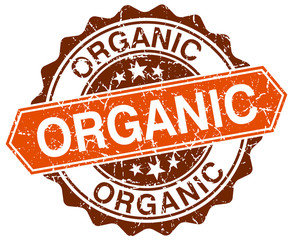 organic orange round grunge stamp on white