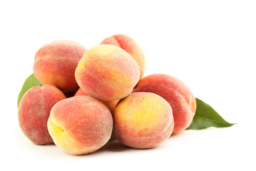 Fresh peaches fruit isolated on a white