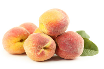 Fresh peaches fruit isolated on a white