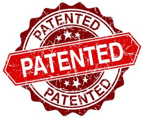 patented red round grunge stamp on white