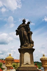 Fototapeta na wymiar Святой Антоний Падуанский скульптура на Карловом мосту в Праге