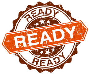 ready orange round grunge stamp on white