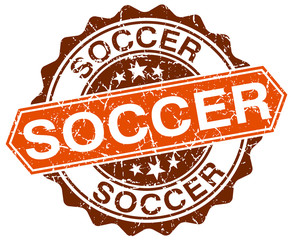 Obraz premium soccer orange round grunge stamp on white