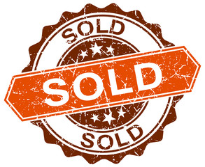 sold orange round grunge stamp on white