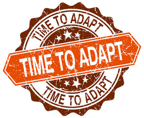 time to adapt orange round grunge stamp on white