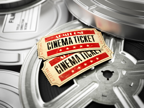 Movie, cinema vintage concept. Tickets on retro film reels and b