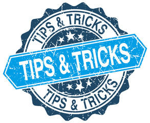 tips & tricks blue round grunge stamp on white
