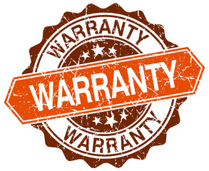 Obraz premium warranty orange round grunge stamp on white