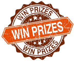 win prizes orange round grunge stamp on white