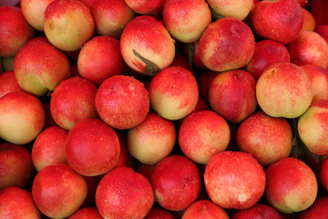 Fototapeta na wymiar Red peaches in china's market