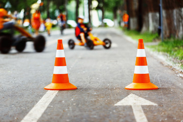 Closeup image of traffic  sign - orange cone with white stripes