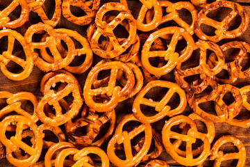 Typical bavarian pretzel on old wooden table