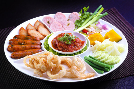 Mix Northern Thai food - Sai Aua (Northern Thai Spicy Sausage), Naem (Sour pork), Cab-Moo (pork snack), Moo-Yor (preserved pork sausage), Nam Prik Aong (Northern Thai Meat and Tomato Spicy Dip)