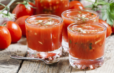 Fototapeta na wymiar Traditional tomato soup gazpacho in a glass, selective focus