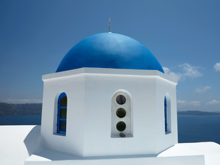 Fototapeta na wymiar Santorini island Greece - beautiful typical blue dome church and