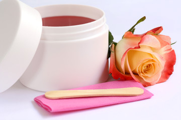 
bodycare, depilation set: wax container, stick and rose

