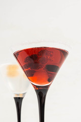 Red cocktail with raspberry